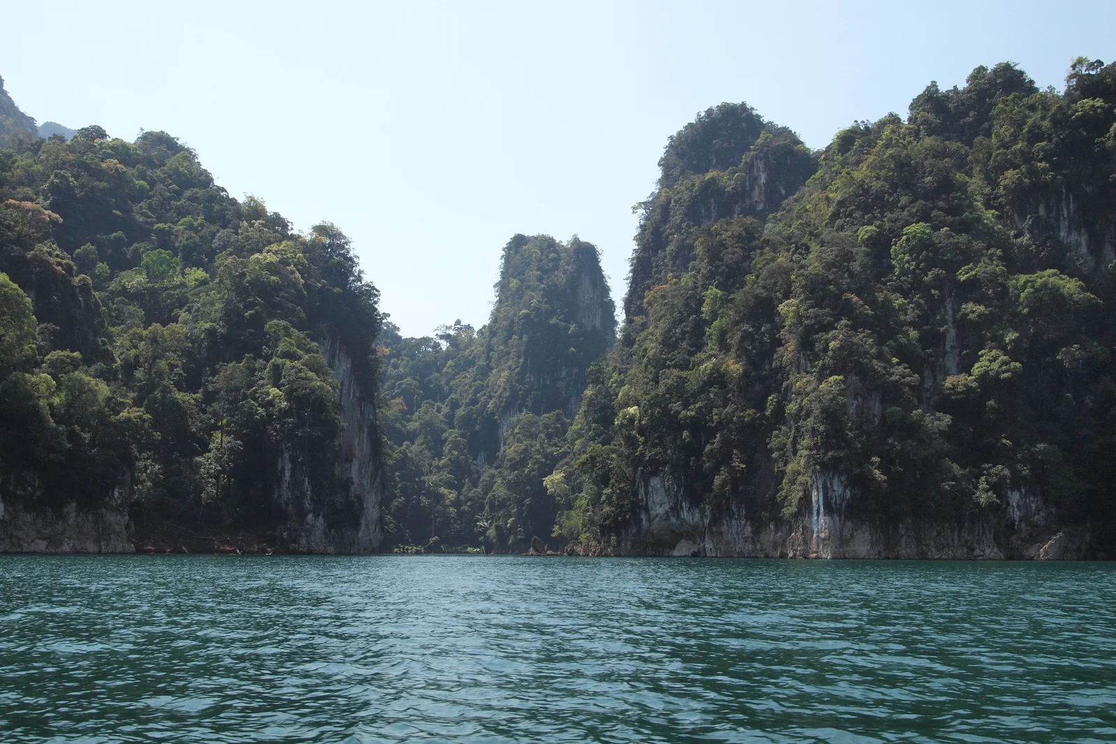 Forested limestone cliffs above Cheow Lan Lake.